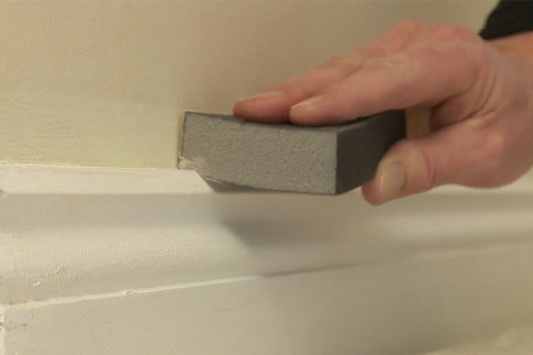 Before you start painting your skirting board, sand it until it's smooth.